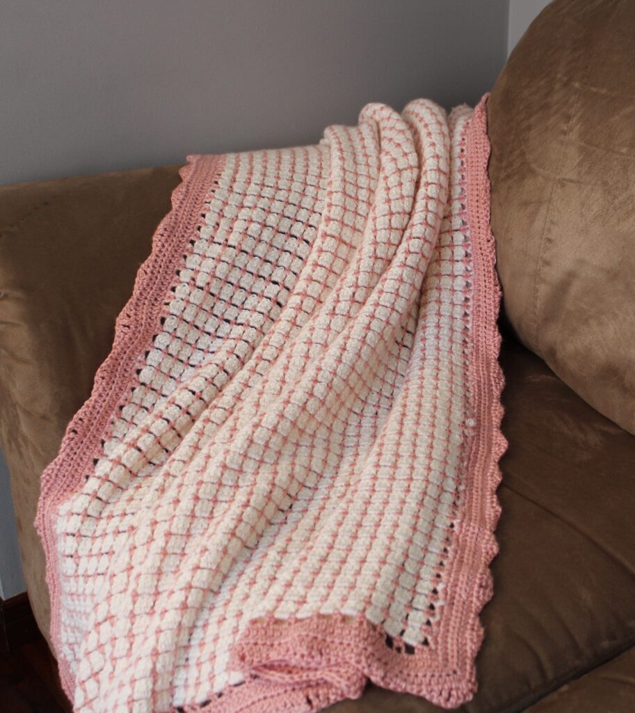Couverture rose et crème pour enfant